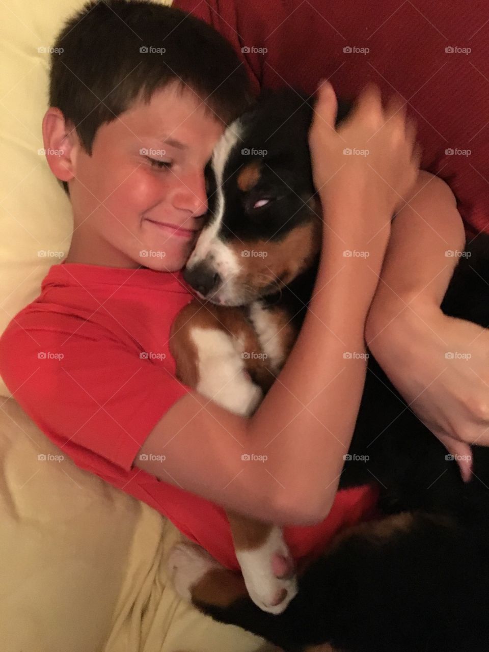 A boy and his puppy