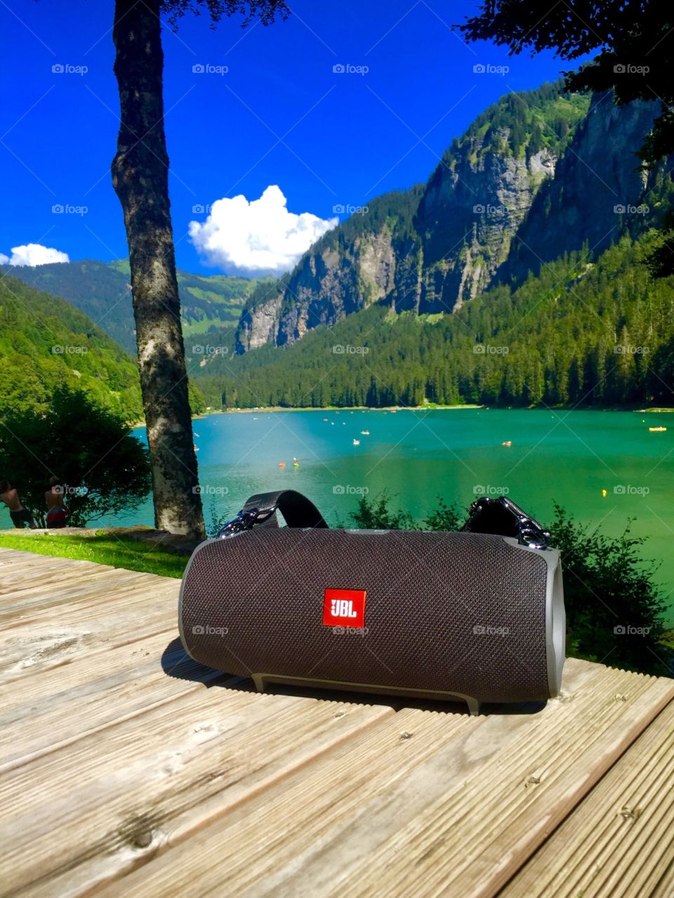 My JBL Bluetooth speaker next to Lake Montriond 