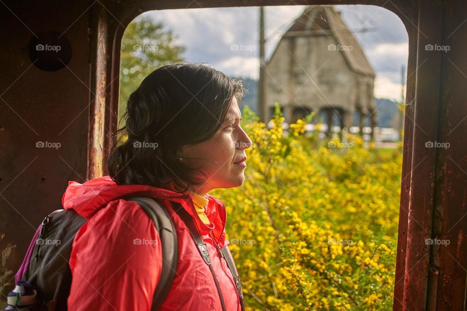 Woman looking out the window