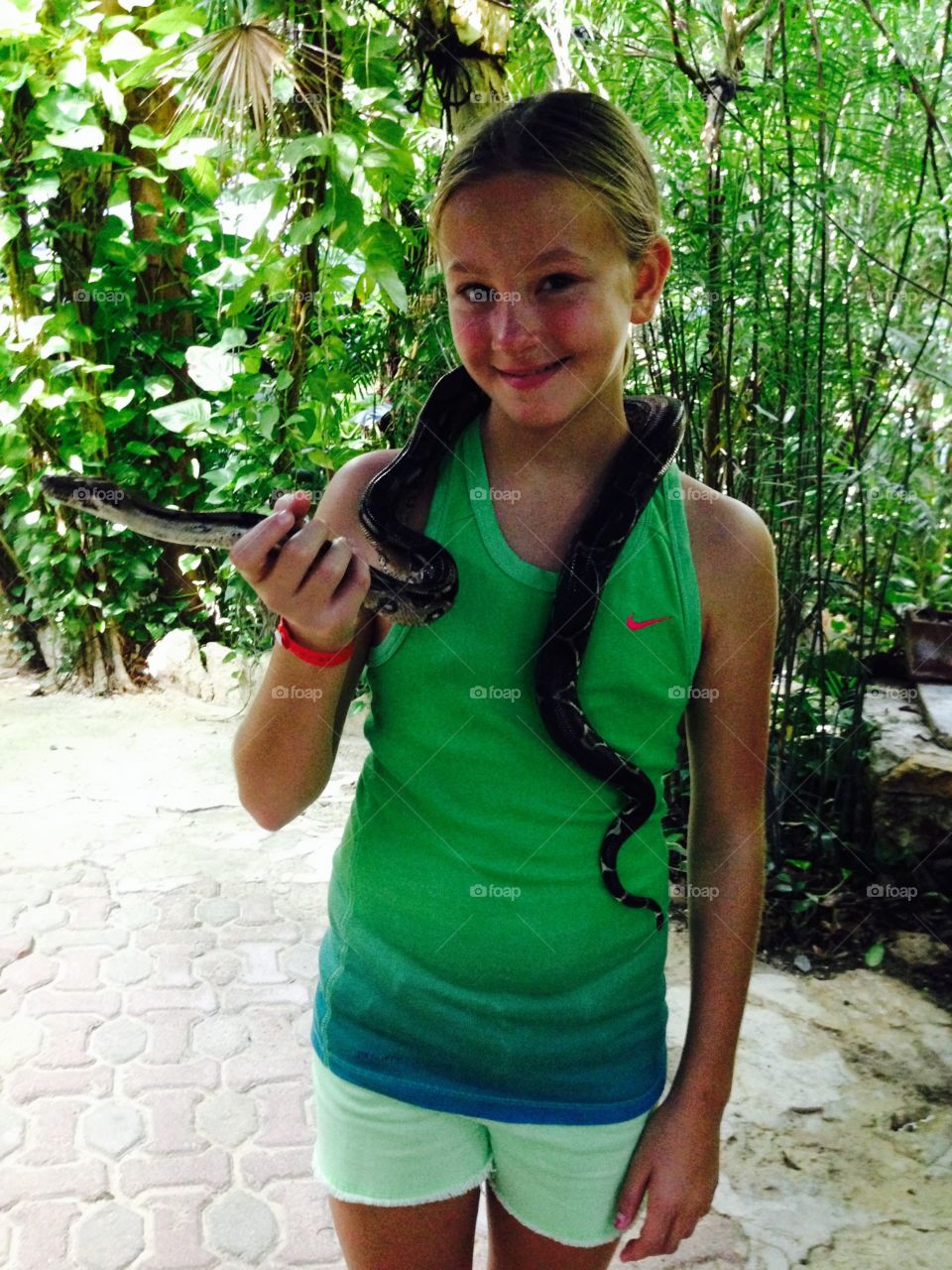 Snake. This was a photo of a girl holding a snake
