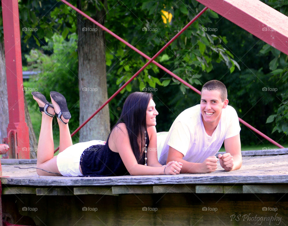Cute couple. adorable couple posing on bridge