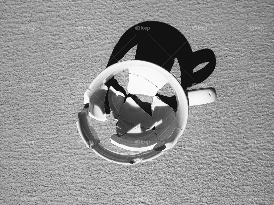 Studio shot of broken tea cup