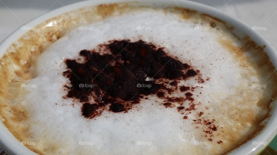 A Cup Of Coffee With Cinnamon