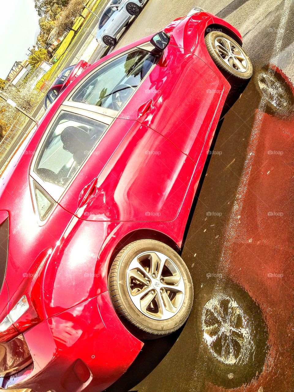 car reflection in puddle