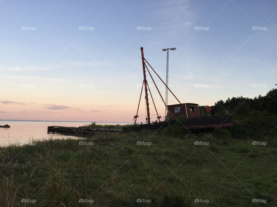 Old boat by the sea