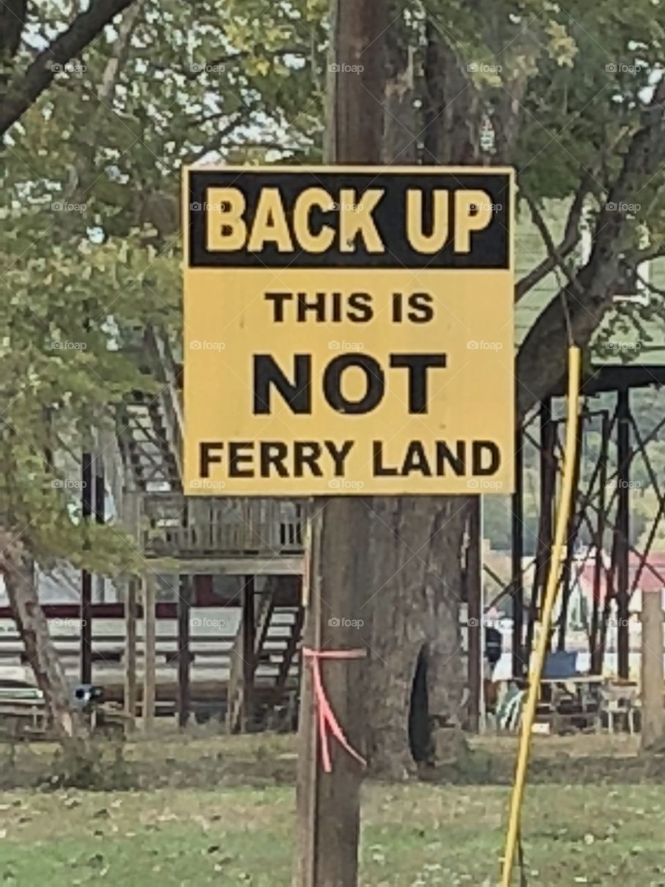 Back Up This Is Not Ferry Land sign on private property near the Grafton Ferry in Grafton, Illinois, USA