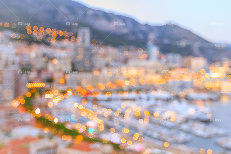 Blurry cityscape, Monte Carlo. Blurry cityscape of Monte Carlo with bokeh at blue hour after sunset, Monaco, Europe.