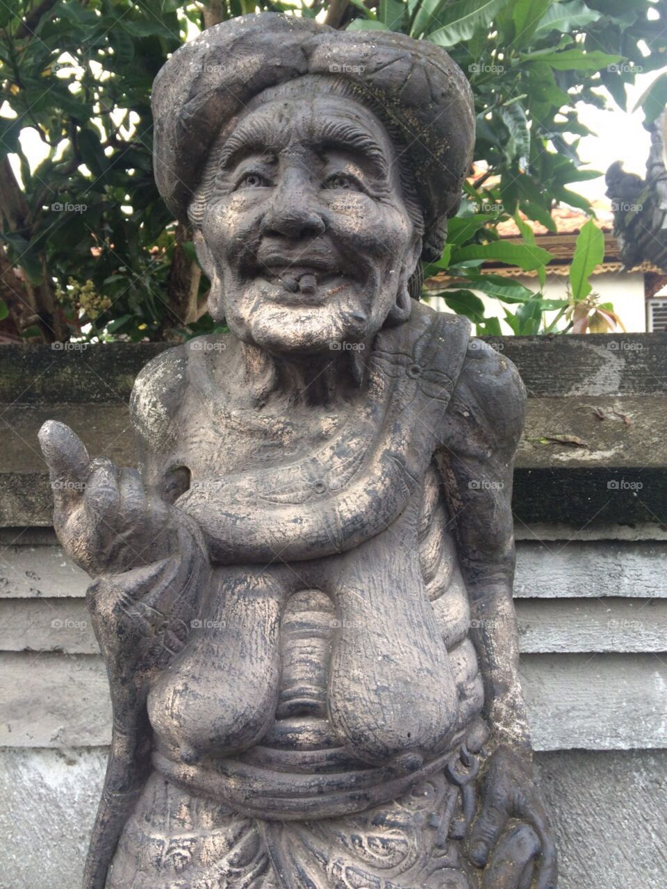 Old lady statue . A statue in bali 
