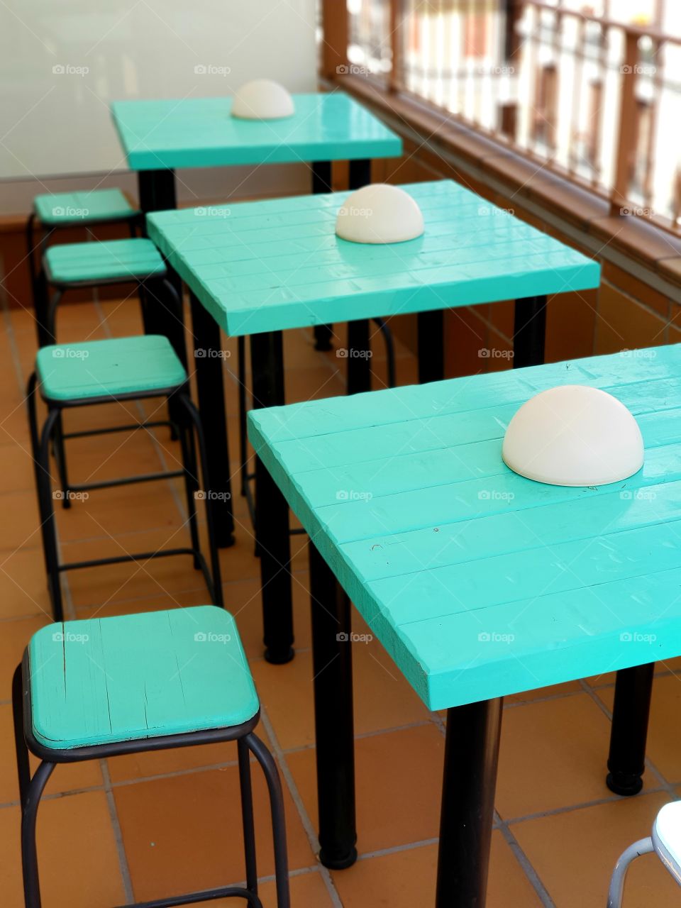Turquoise tables and chairs