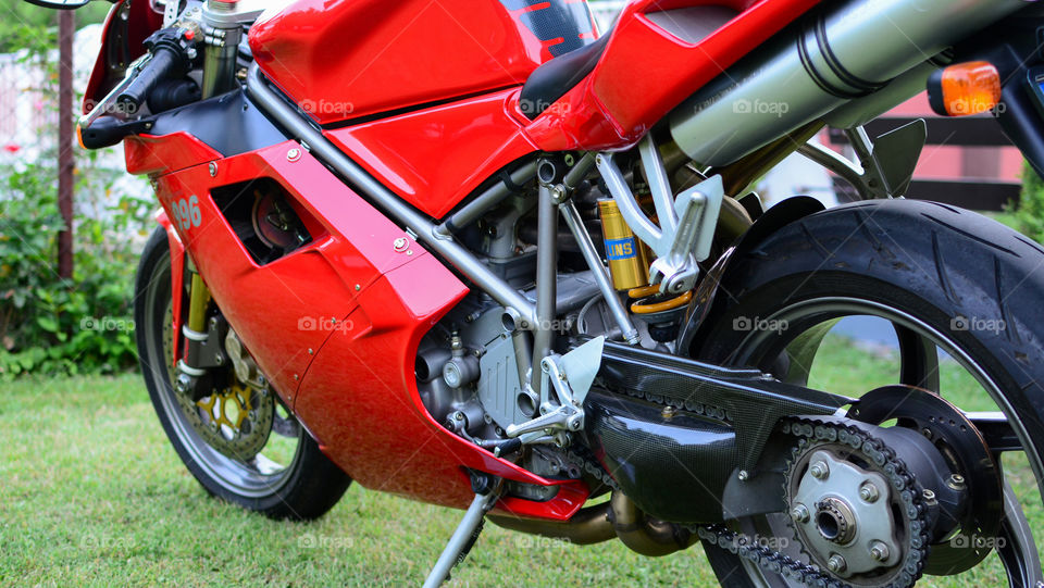 red ducati 996s motorcycle outdoors