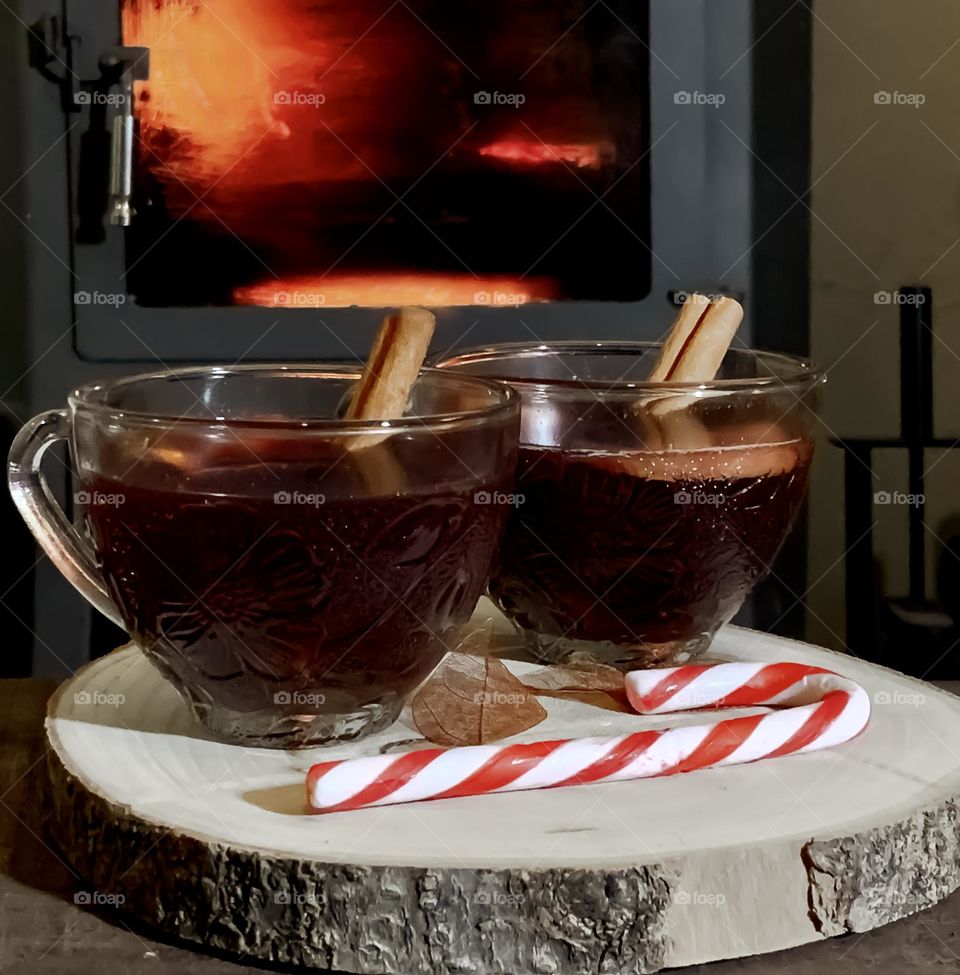 Mulled wine and a candy cane by the fire