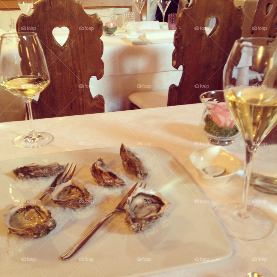 italy champagne fine dining oysters by pearl