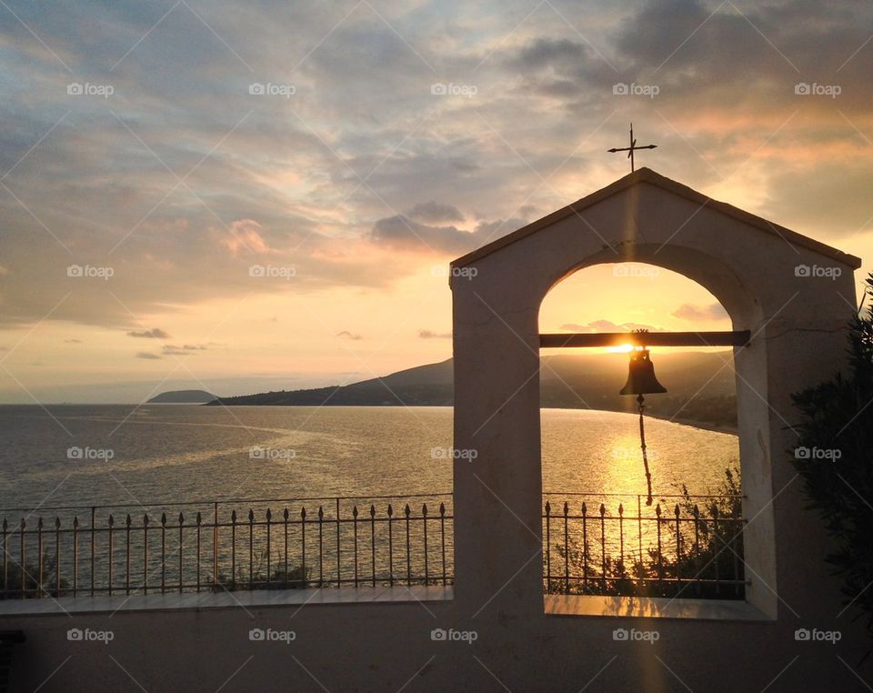 Sunset with a bell tower