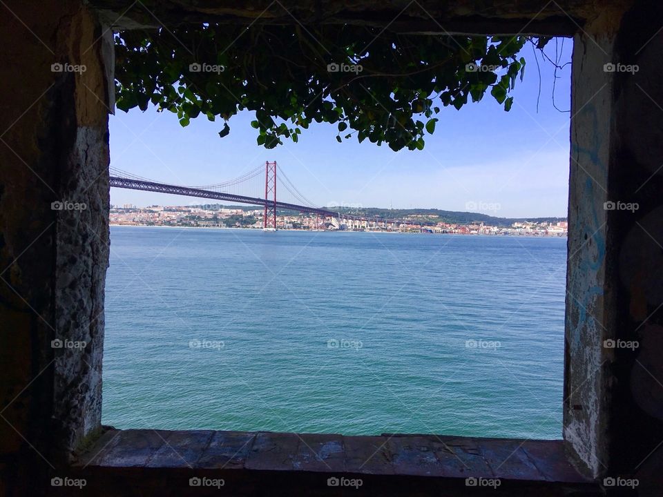 Window, bridges and sea 