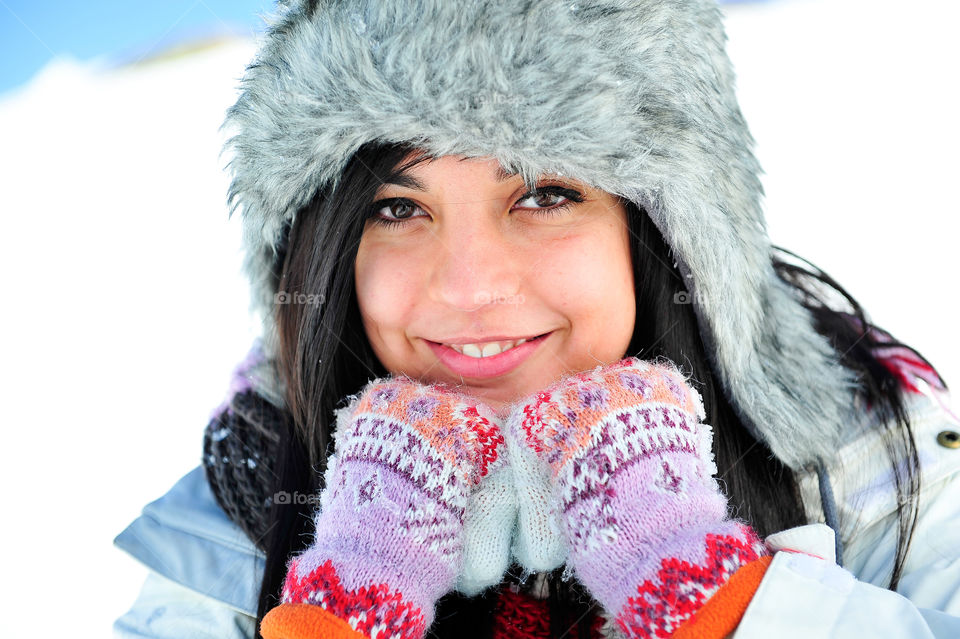 Little girl lying with her teddy bear