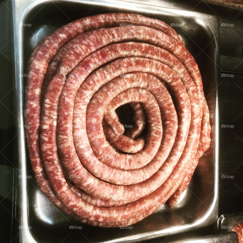 Just a big tray full of Italian sausage. Delicious food ready to feed a party. 