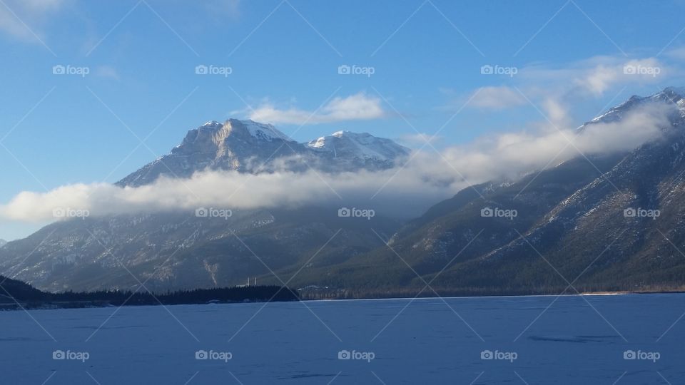 Frozen Lake With Mountains