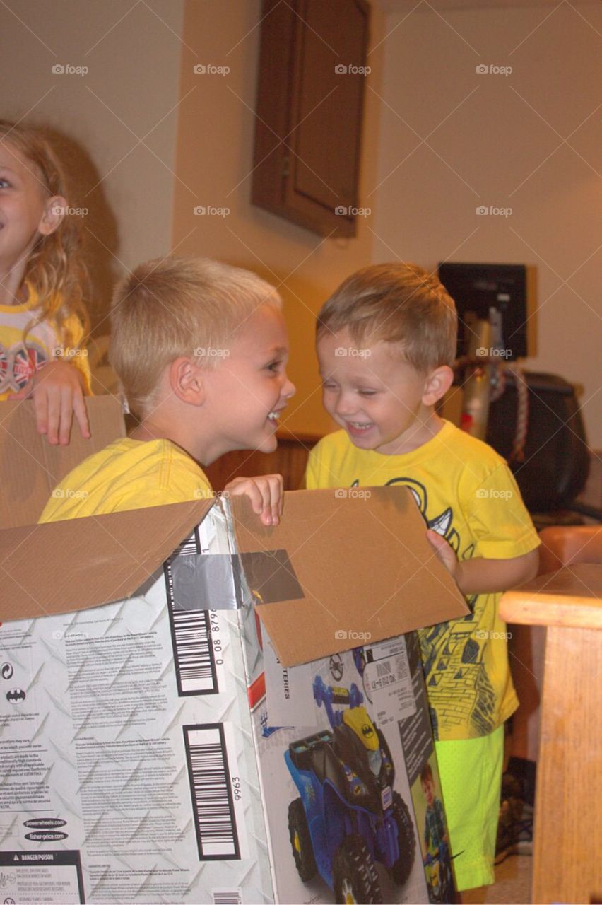 Siblings playing at home