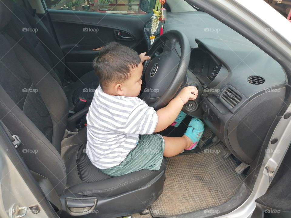 Baby driving lorry