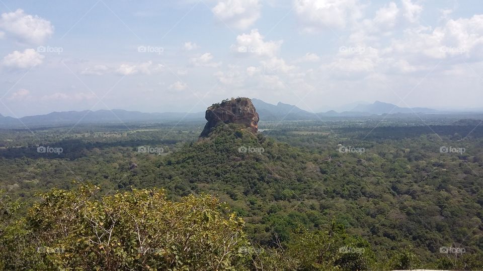 Sigiriya rock in a sunny day from pidurangala rock sri lanka