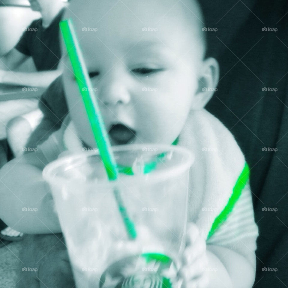 My son trying to take my Starbucks cup