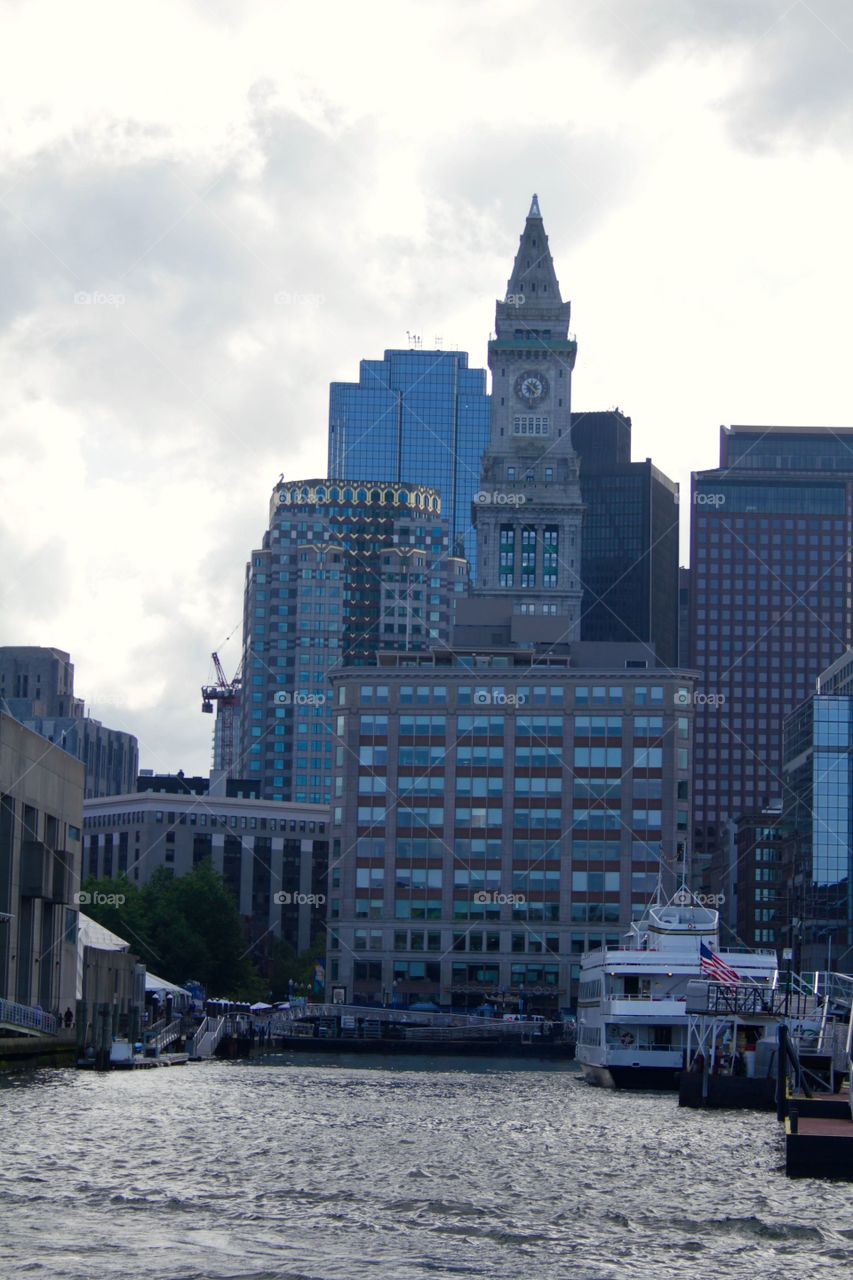 Boston clocktower seen from the water. 