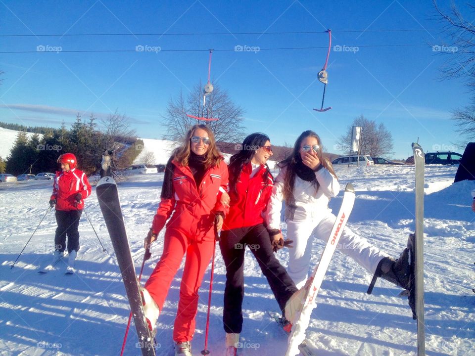 Friends enjoying skiing