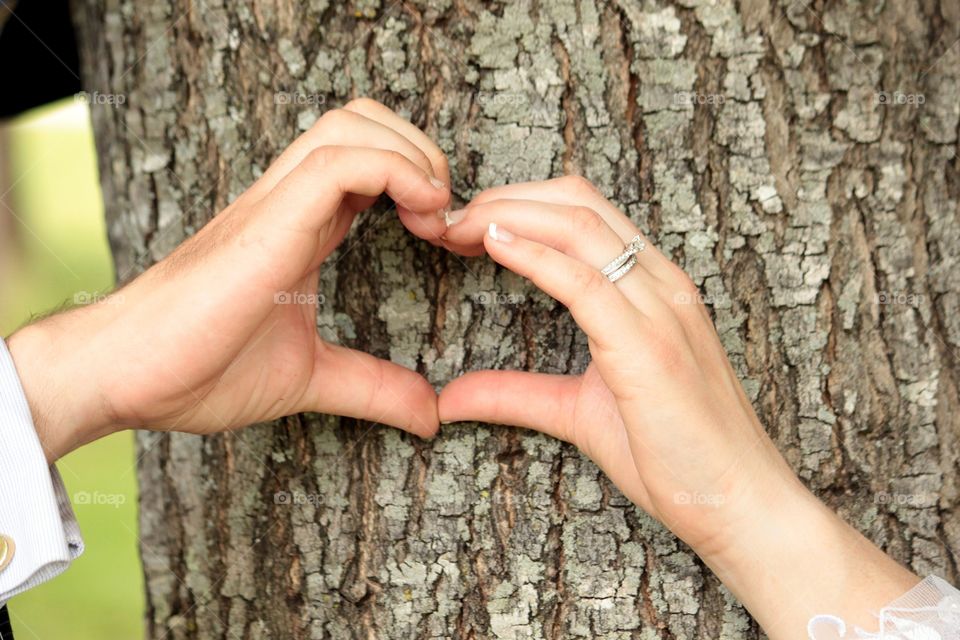 The love this young couple shares is playful and fun! They were so sweet as they joined their lives as one. Instead of carving their initials on a tree they showed their love another way!