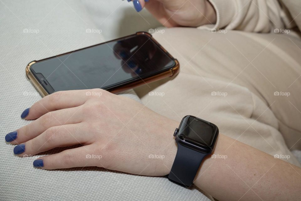 Hands with blue manicure