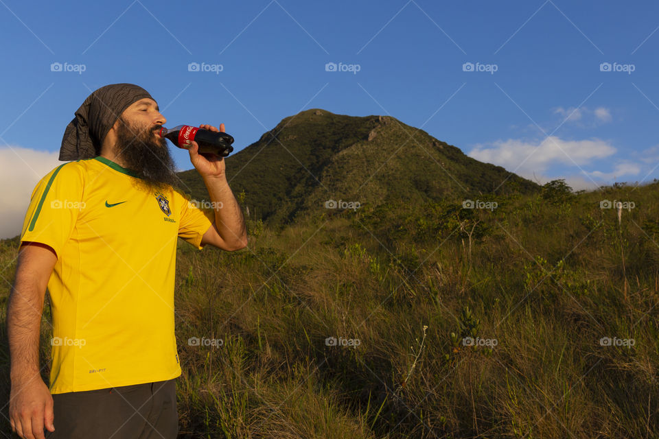 Coca Cola face to face with the mountain.