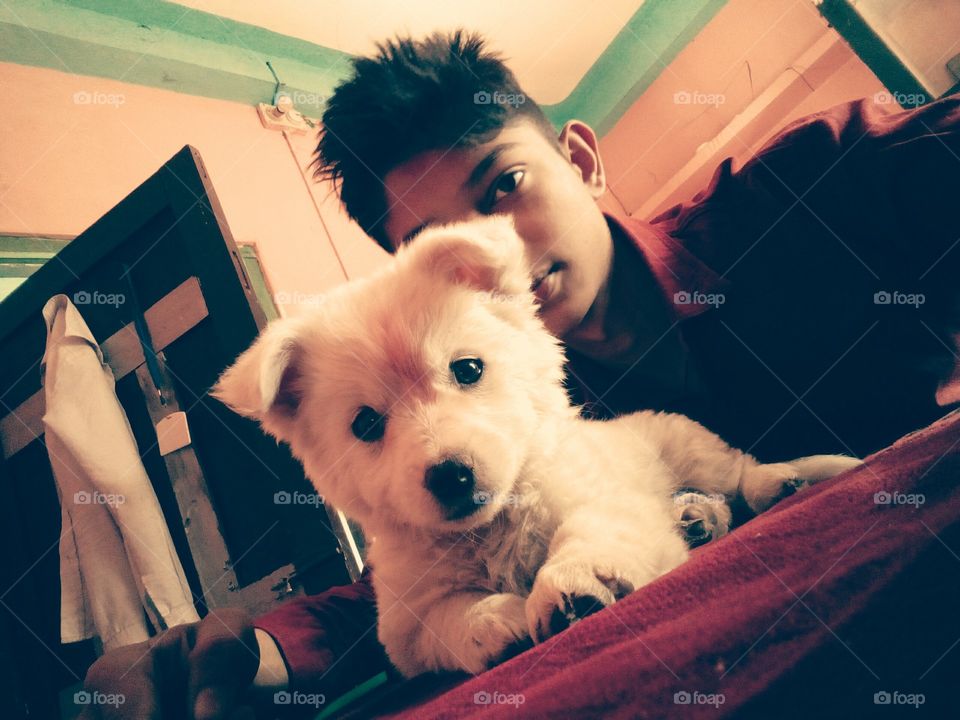 Indian boy with his pet dog