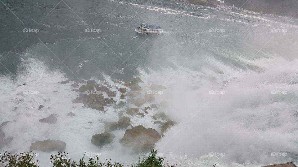 The Maiden of the Mist making her wet and blustery pass at Niagra Falls.