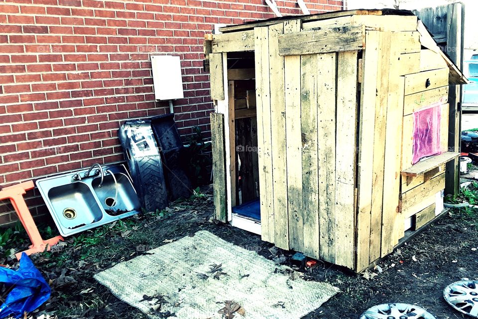 Found some wood laying around to build my baby a play house.SHE LOVES IT!!!