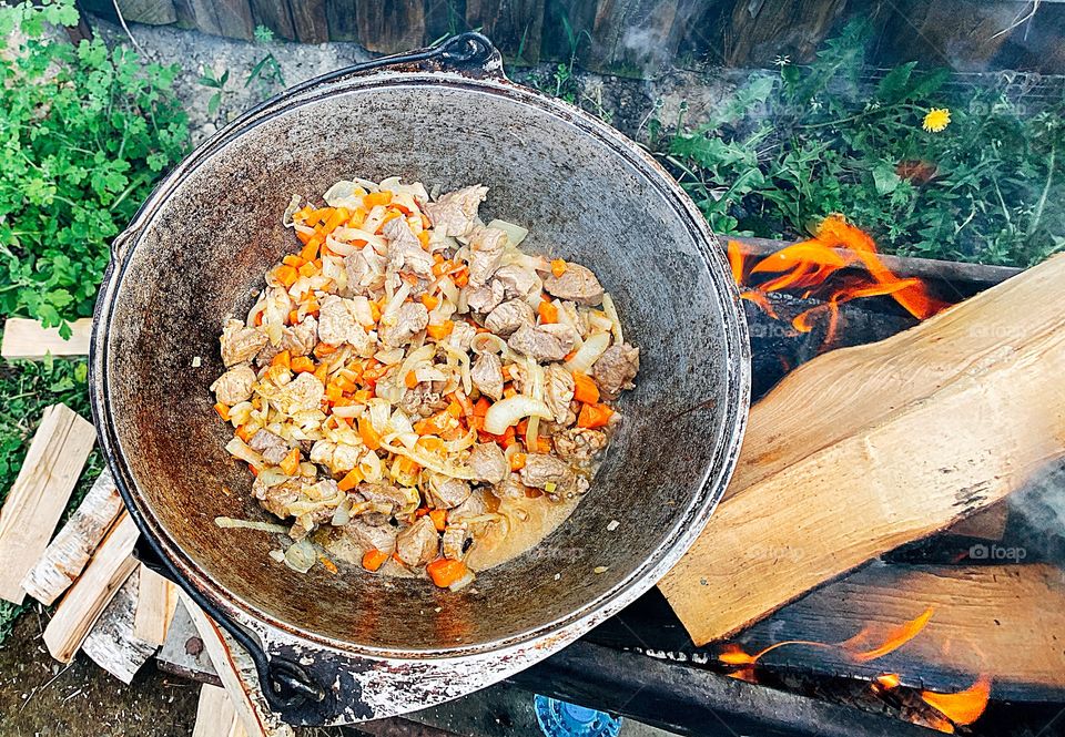 Cooking food on the campfire