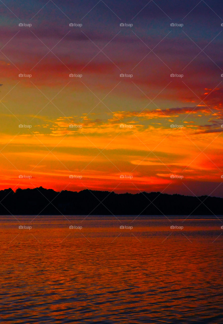 Dramatic sky reflecting in sea