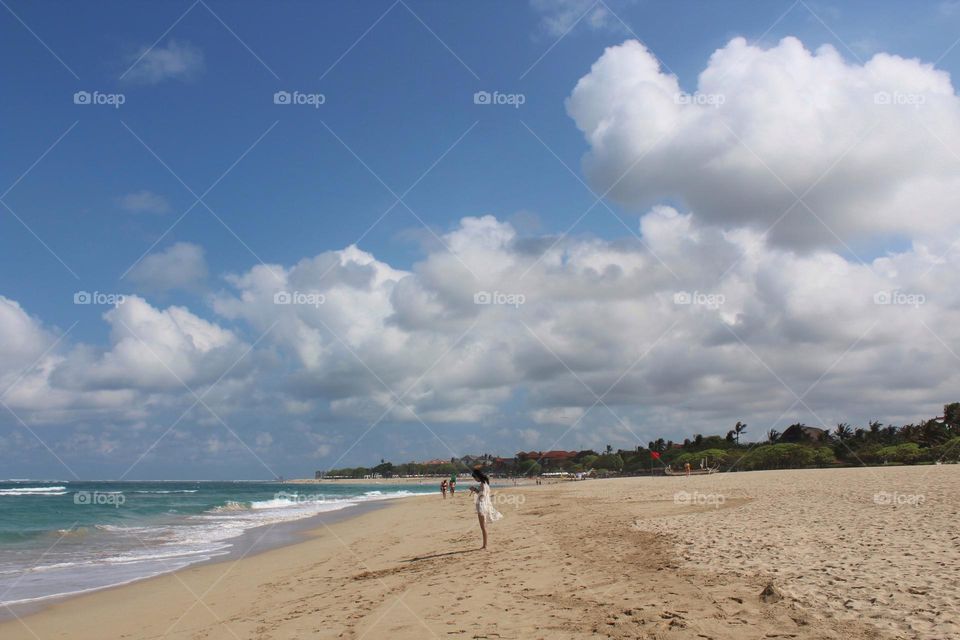 Panoramic sky and coastline views in Nusa Dua resort area, Bali. 