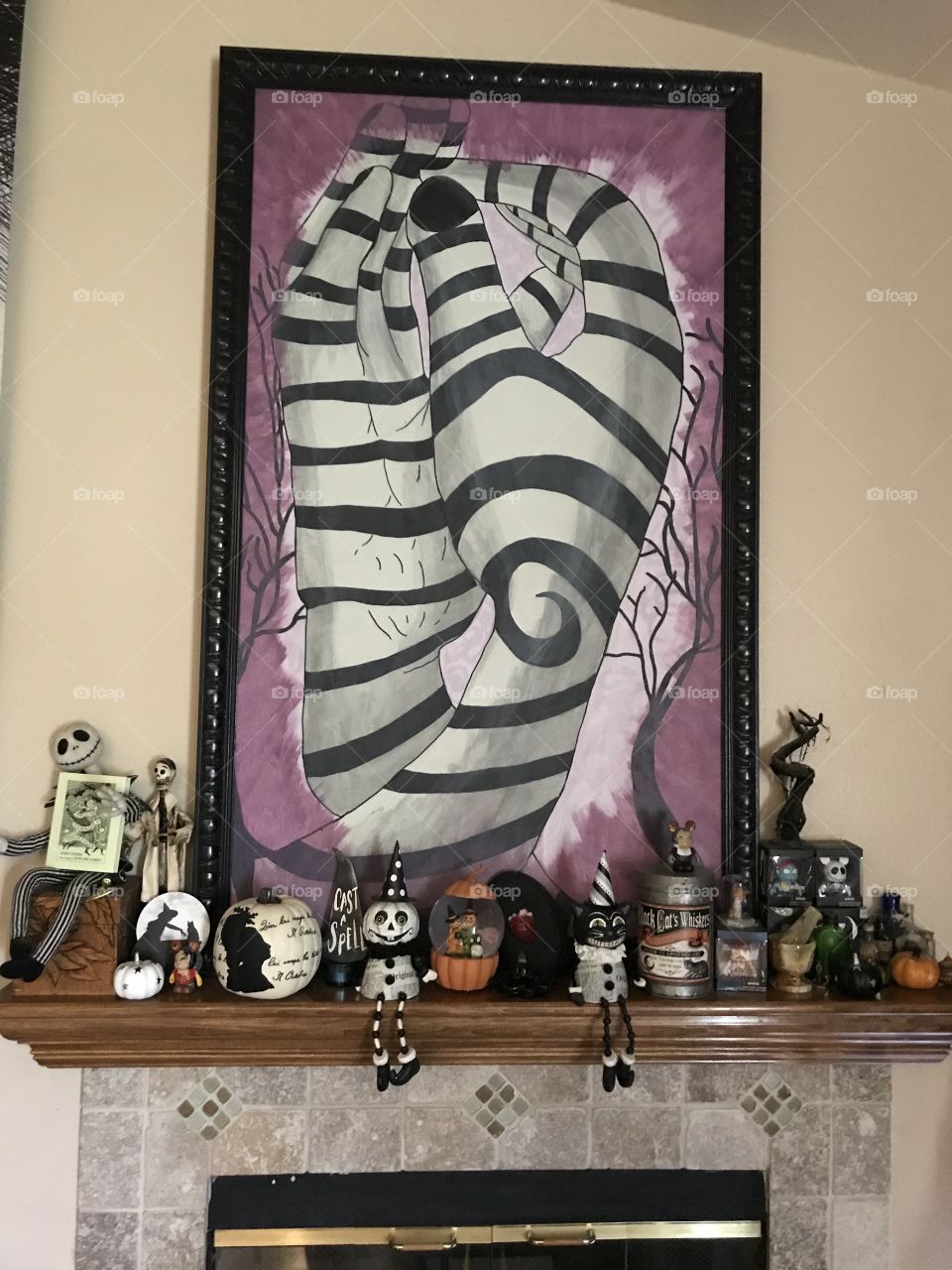 Halloween themed alter display with a gorgeous hand painted canvas and nightmare before Christmas ornaments 