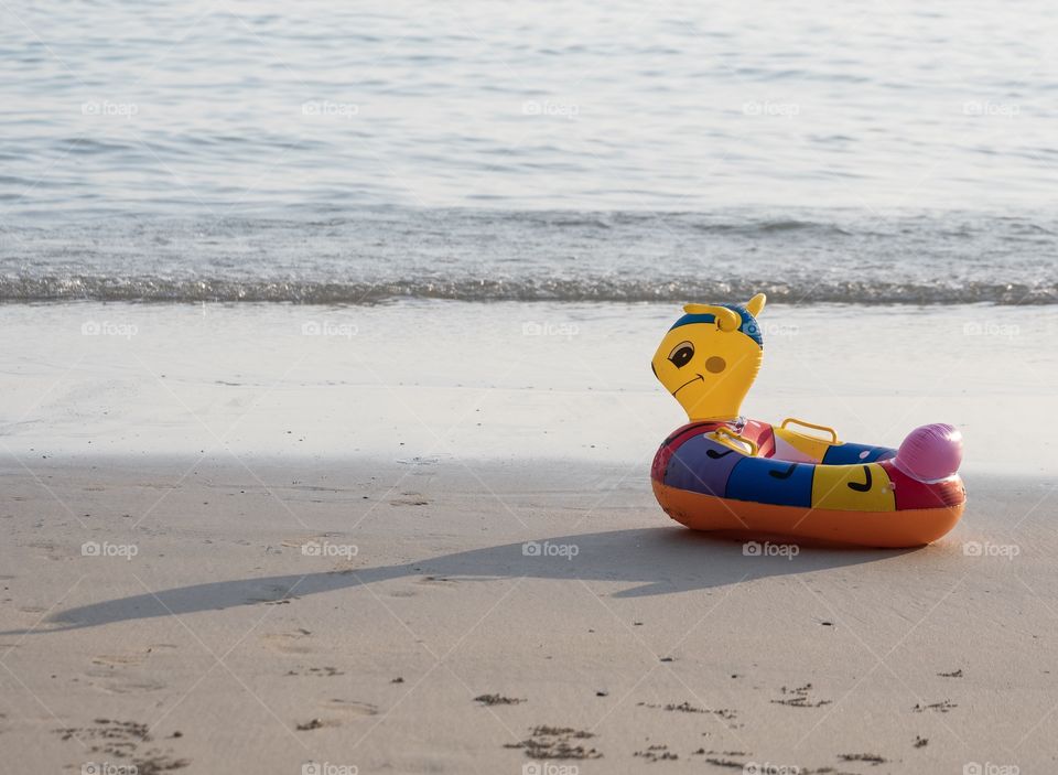 Kid’s cute boat on beautiful summer beach