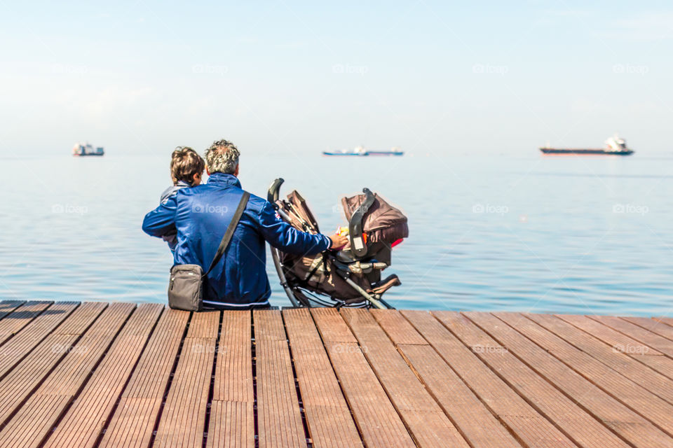 Father And Children At The Dock
