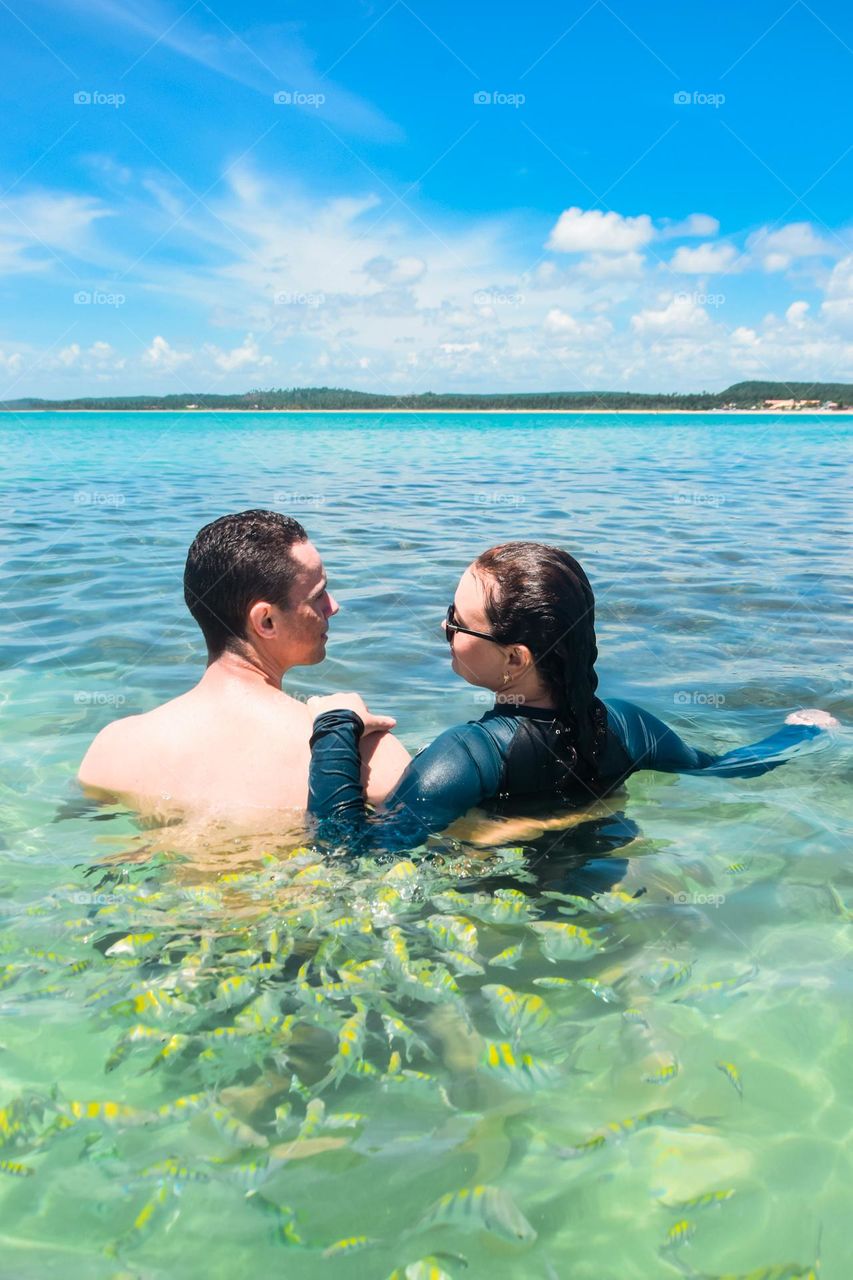 happy couple on beach vacation.