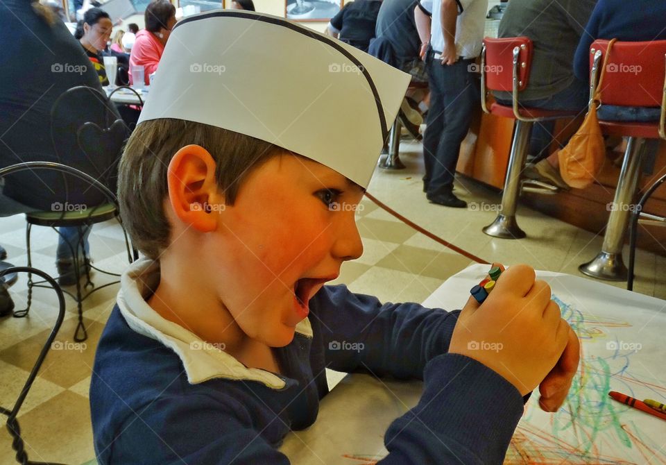 Happy Boy In A Sailor Hat