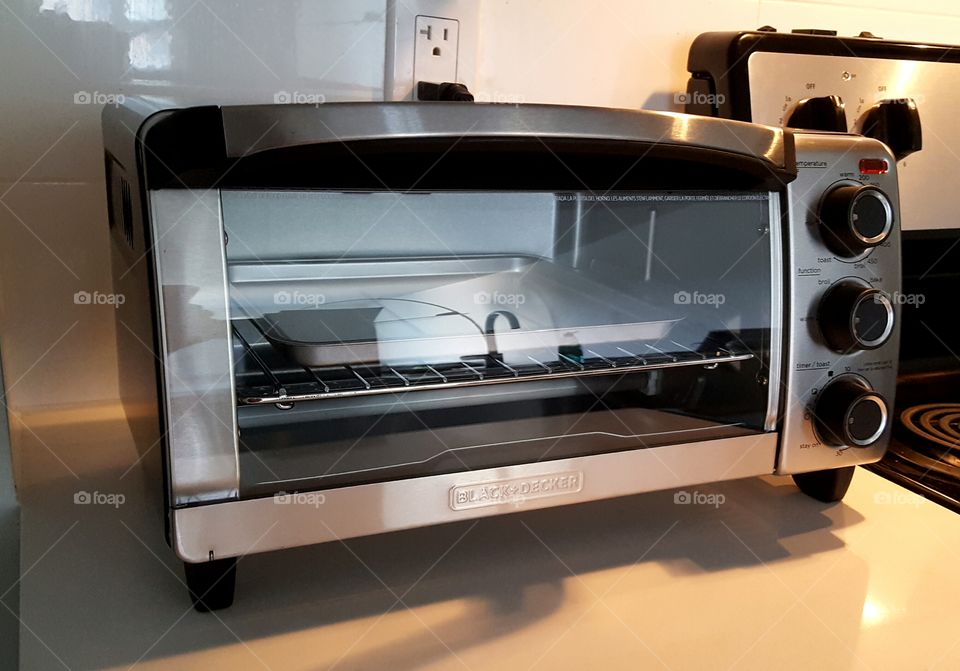 Brand new stainless steel toaster oven (Black & Decker)