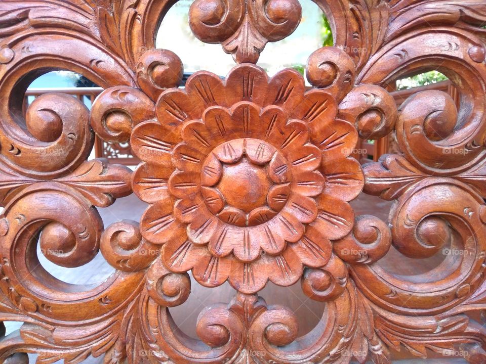 Beautiful wood carving on the park