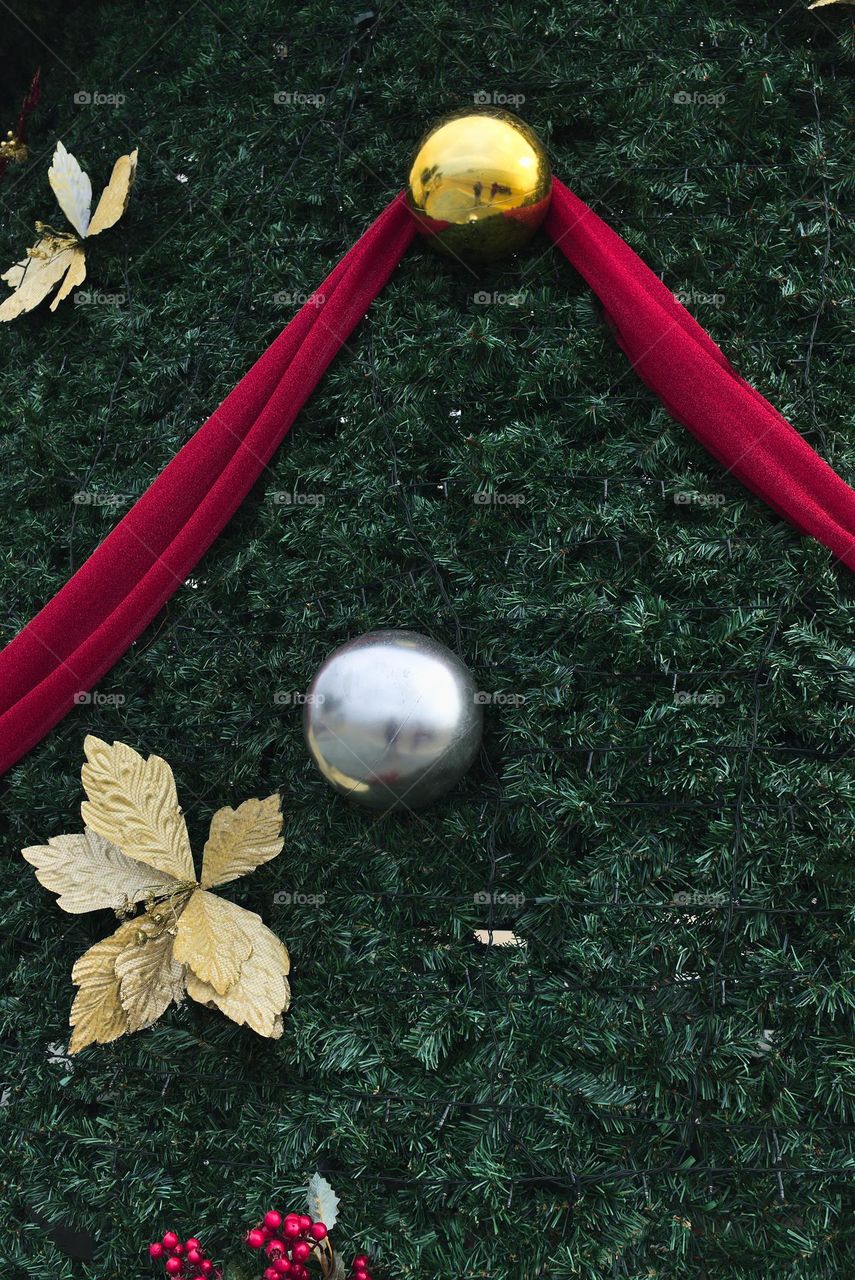 Christmas tree ornaments. Colored balls and leaves