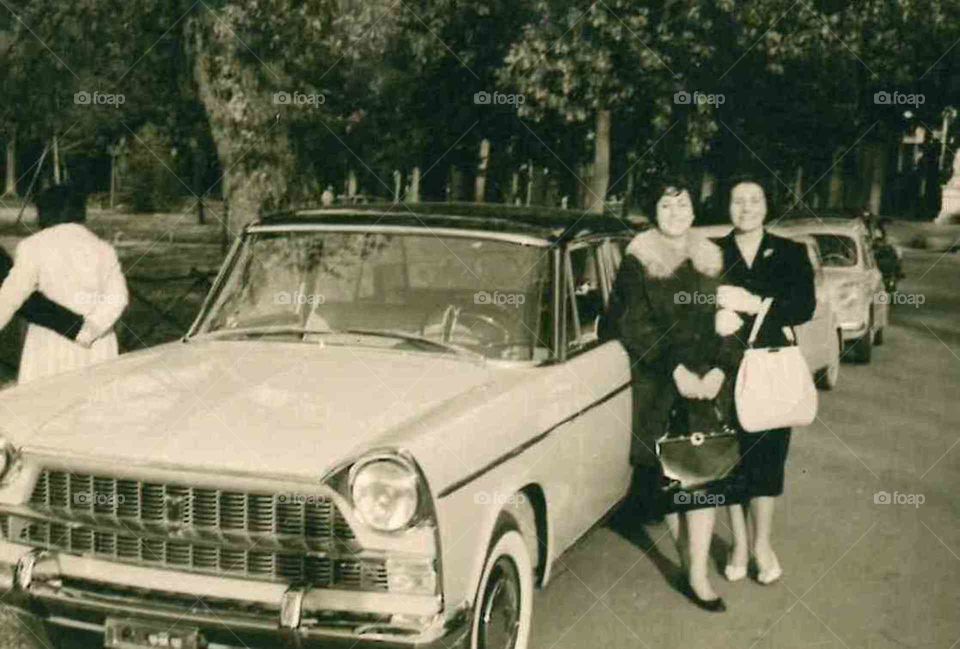 woman and car 60's