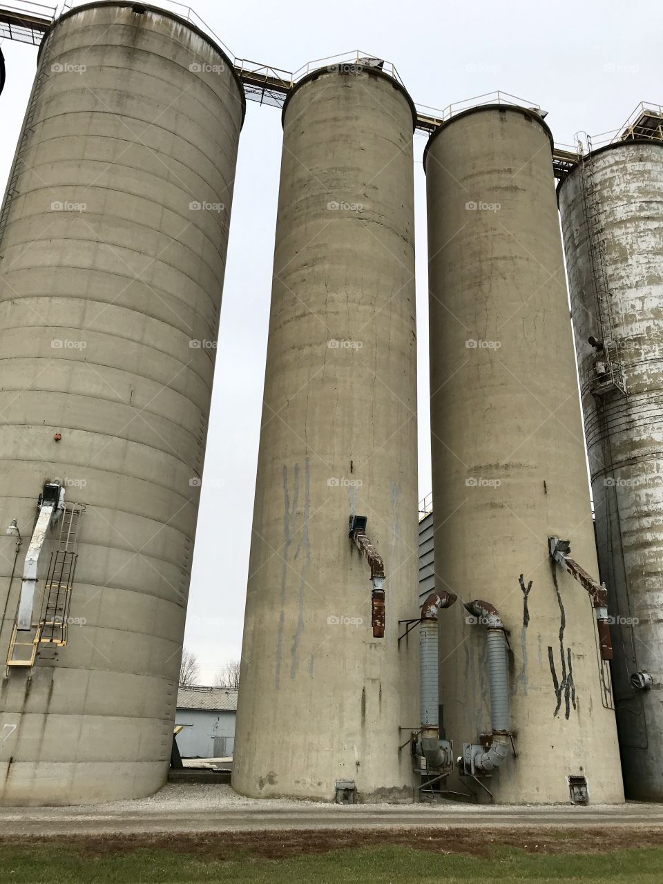 Tall Farm grain silos in rural town of Jenera Ohio 