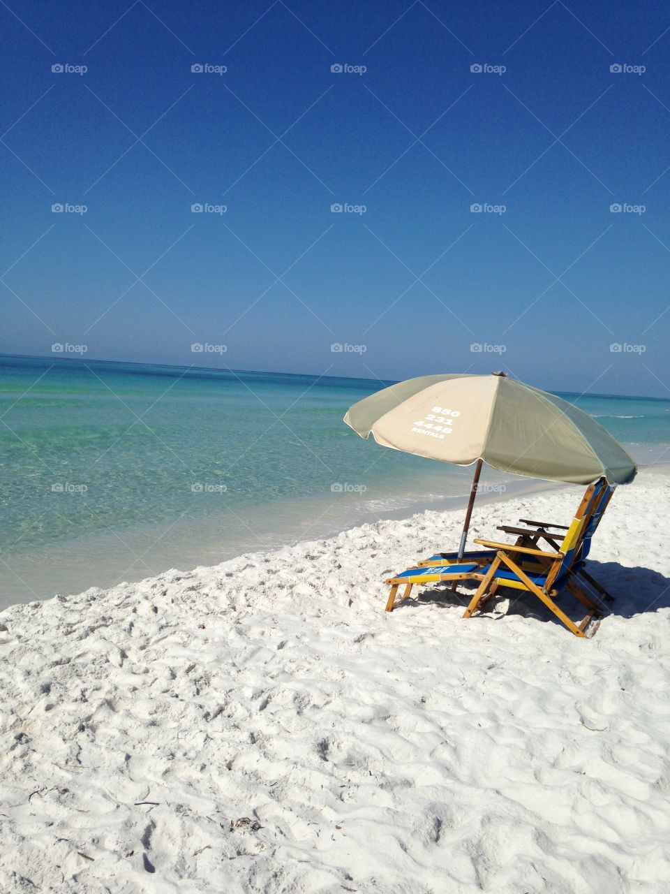 Umbrella at the beach. Relaxing at the beach