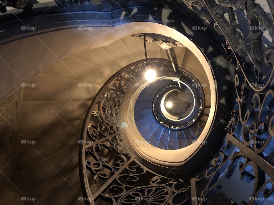 A spiral staircase at Versailles, Paris France. 