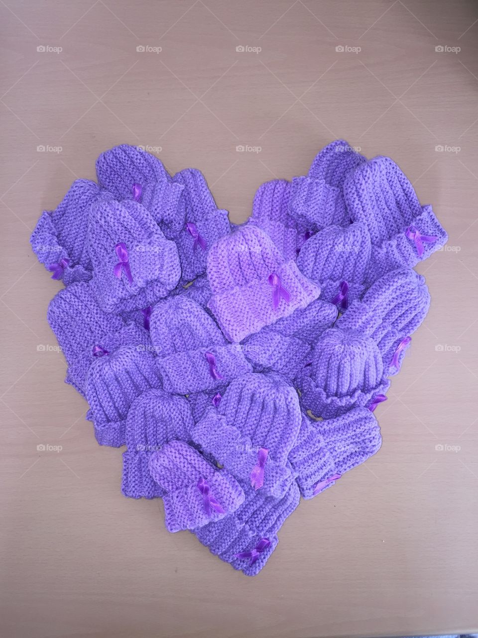 Purple Baby hats for premature babies on World Prematurity Day November 17th.