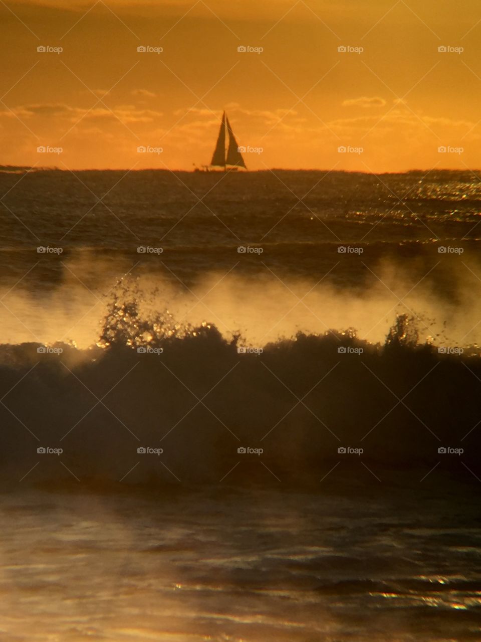 Sunrise at Oceanridge FL where warm waters and cold air creates sea mist.